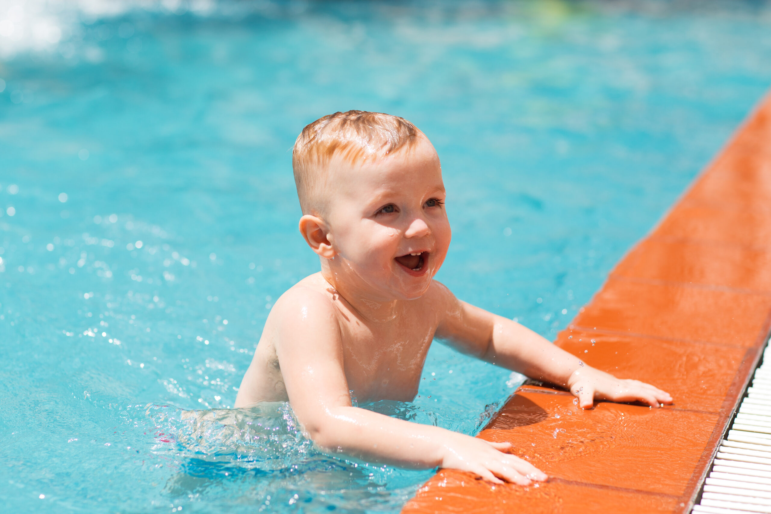portrait happy little boy swimming pool scaled